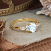 Oval Cut 4 Prong Moonstone Classic Side Stone Engagement Ring